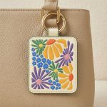retro print card holder bag charm