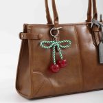 festive cherry bag charm