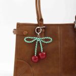 festive cherry bag charm