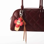 red flower bag charm
