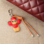 red flower bag charm
