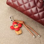 red flower bag charm