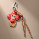 red flower bag charm